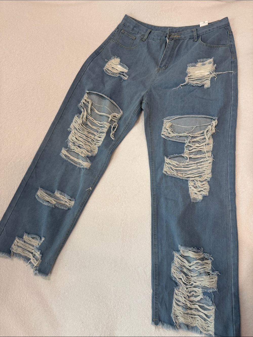 Distressed Women’s Blue Ripped Jeans